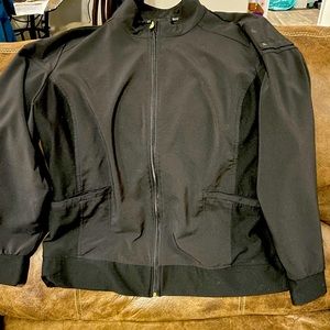 Cherokee IFlex black scrub jacket with pen holder sleeve